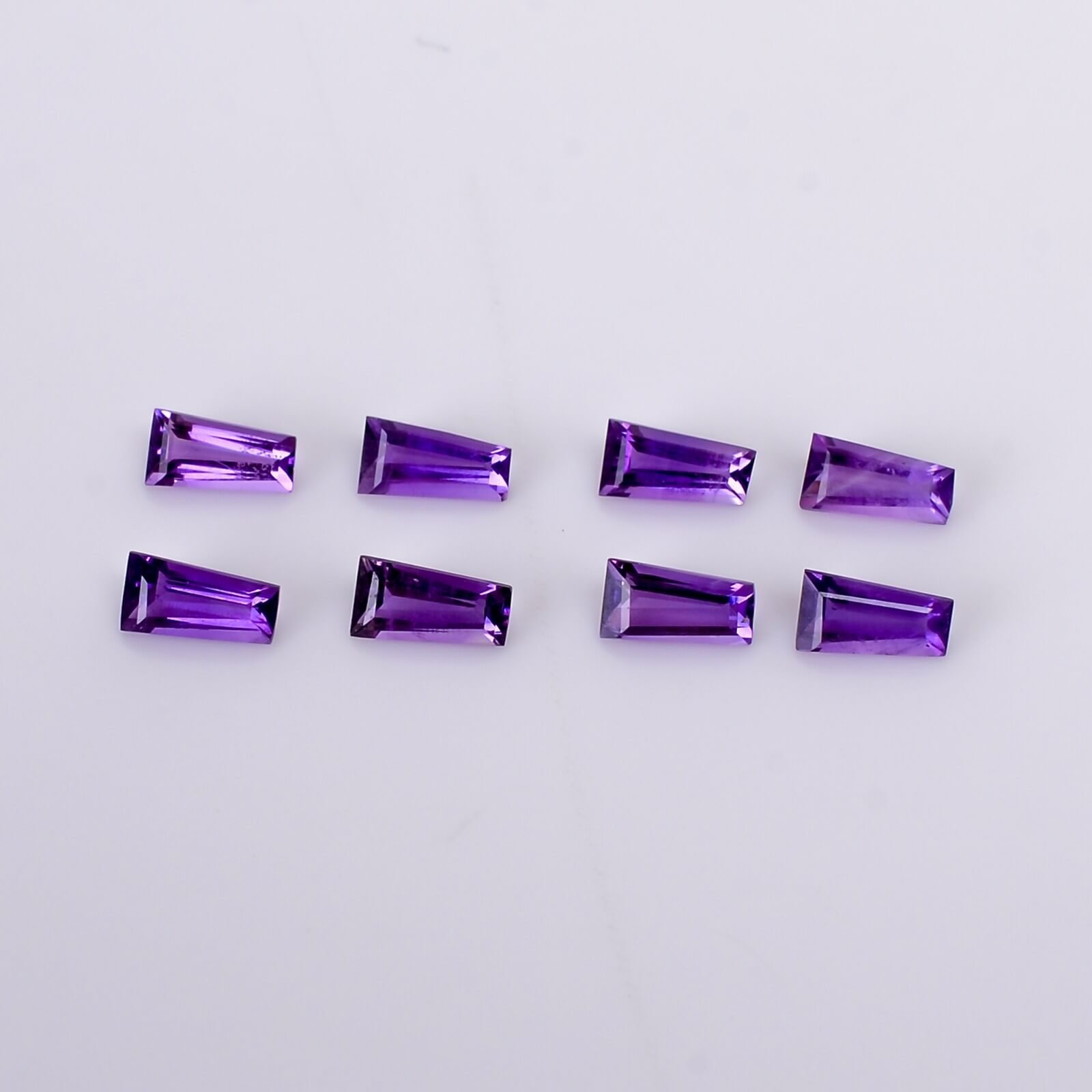 Natural Amethyst gemstone 0.11ct purple taper cut Brazil origin available in USA UK